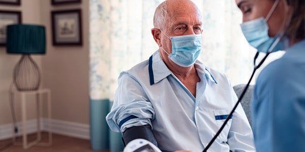 Elderly man getting a check up