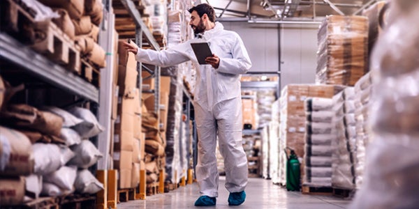 warehouse employee checking inventory